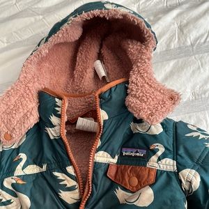 Patagonia reversible tribbles jacket with swan pattern